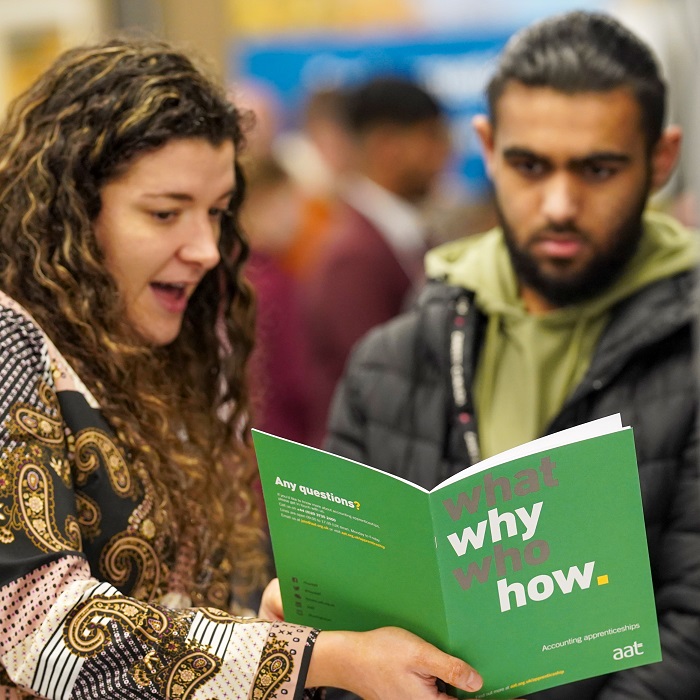 people talking at event 